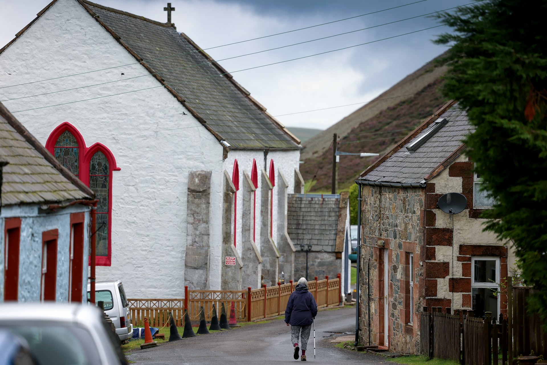 Members of the public are seen walking in Scotland’s highest village